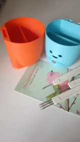 Orange and blue cute tool organizers side by side