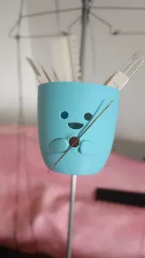 Cat-face tool organizer with custom clamp on the tension mast