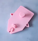 Pink 3D-printed drop stitch carriage for Brother 5gg knitting machines