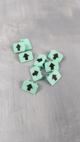 Mint green needle bed markers with arrows