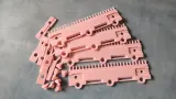 Modular cast-on comb segments and clips laid out