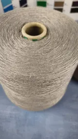 Cone of grey beige melange cotton acrylic machine knitting yarn