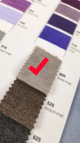 Grey beige melange yarn shade marked on the colour card